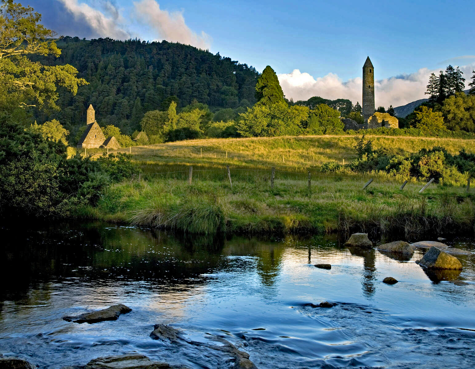 The round tower and monastic graveyard at Glendalough, County Wicklow